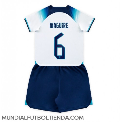Camiseta Inglaterra Harry Maguire #6 Primera Equipación Replica Mundial 2022 para niños mangas cortas (+ Pantalones cortos)